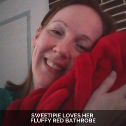 Sweetipie-loves-her-fluffy-red-bathrobe-caption